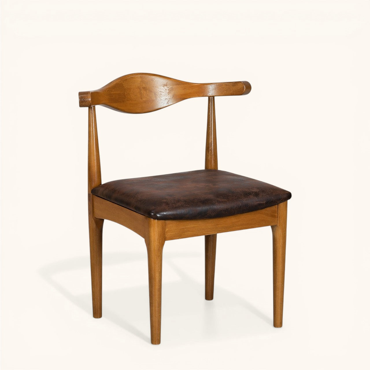 Esszimmerstuhl aus Holz mit geschwungener Rückenlehne und dunkel gepolsterter Sitzfläche, klassischer Designerstuhl für Esszimmer und Wohnbereich